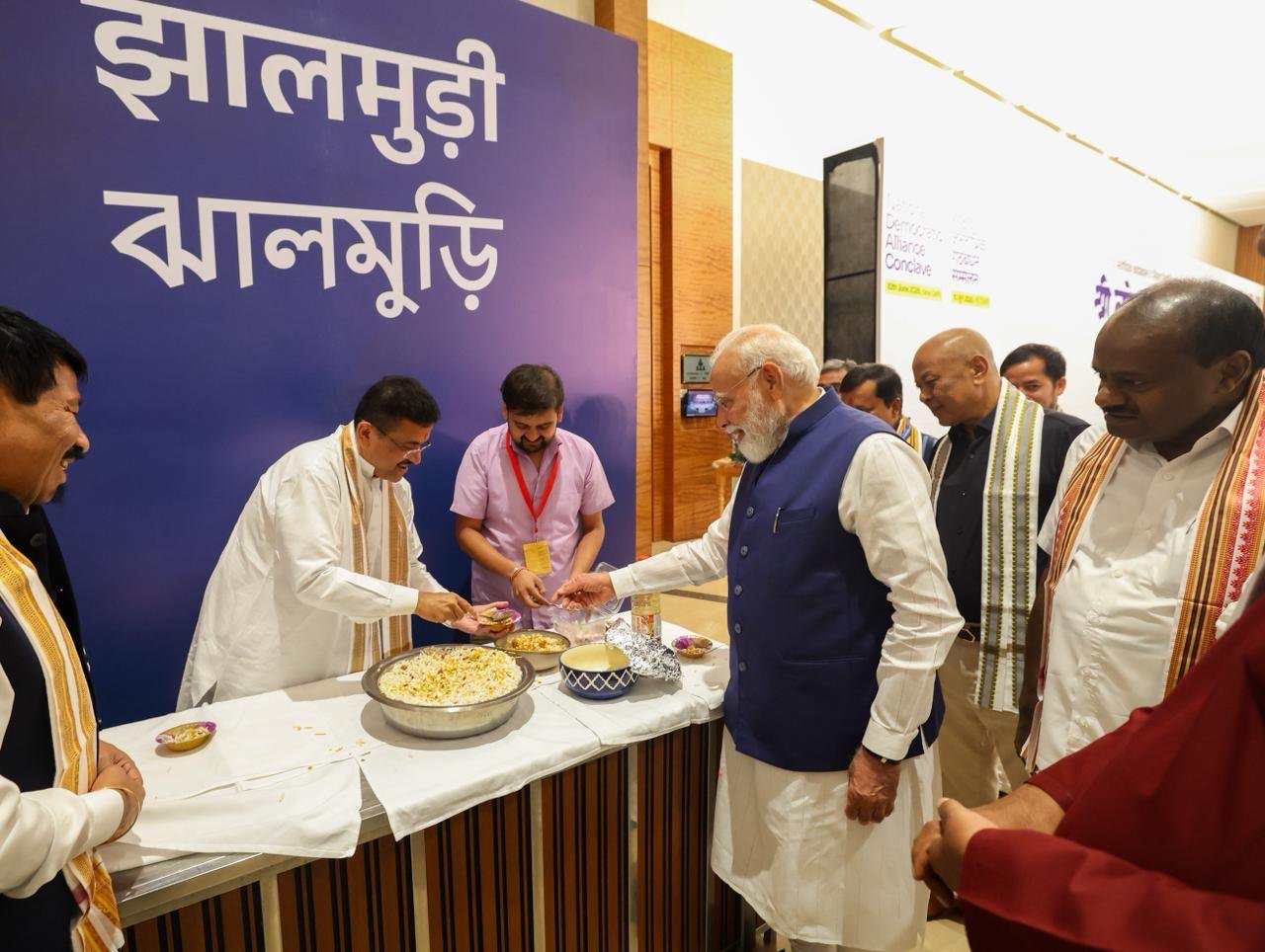 Bengal CM Suvendu Adhikari Serving Jhalmuri To PM Narendra Modi during today's NDA Conclave